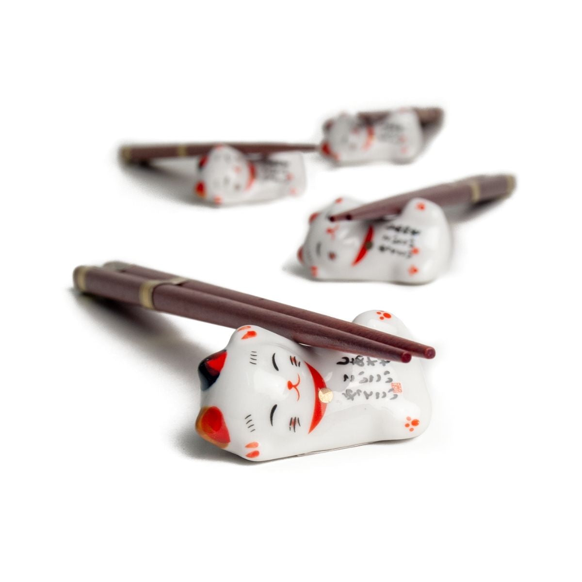 Ablage für Essstäbchen mit Katzenmotiv mit Essstäbchen